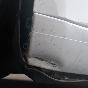Electrified Collision - Damage behind front wheel from a carwash.  Arseen auto body fixed it fast! - Body Shops Near Me - San Jose, California