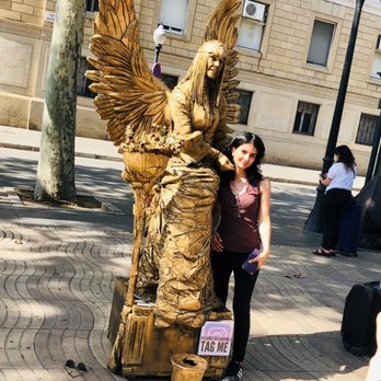Las Ramblas - fun to see these people to change themselves in to statue - Local Flavor Near Me - Barcelona, B