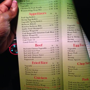 Super Dragon - a hand holding a menu for a restaurant - Chinese Near Me - Lauderhill, Florida Super Dragon - a hand holding a menu for a restaurant - Chinese Near Me - Lauderhill, Florida