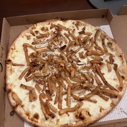 a pizza with a lot of toppings
