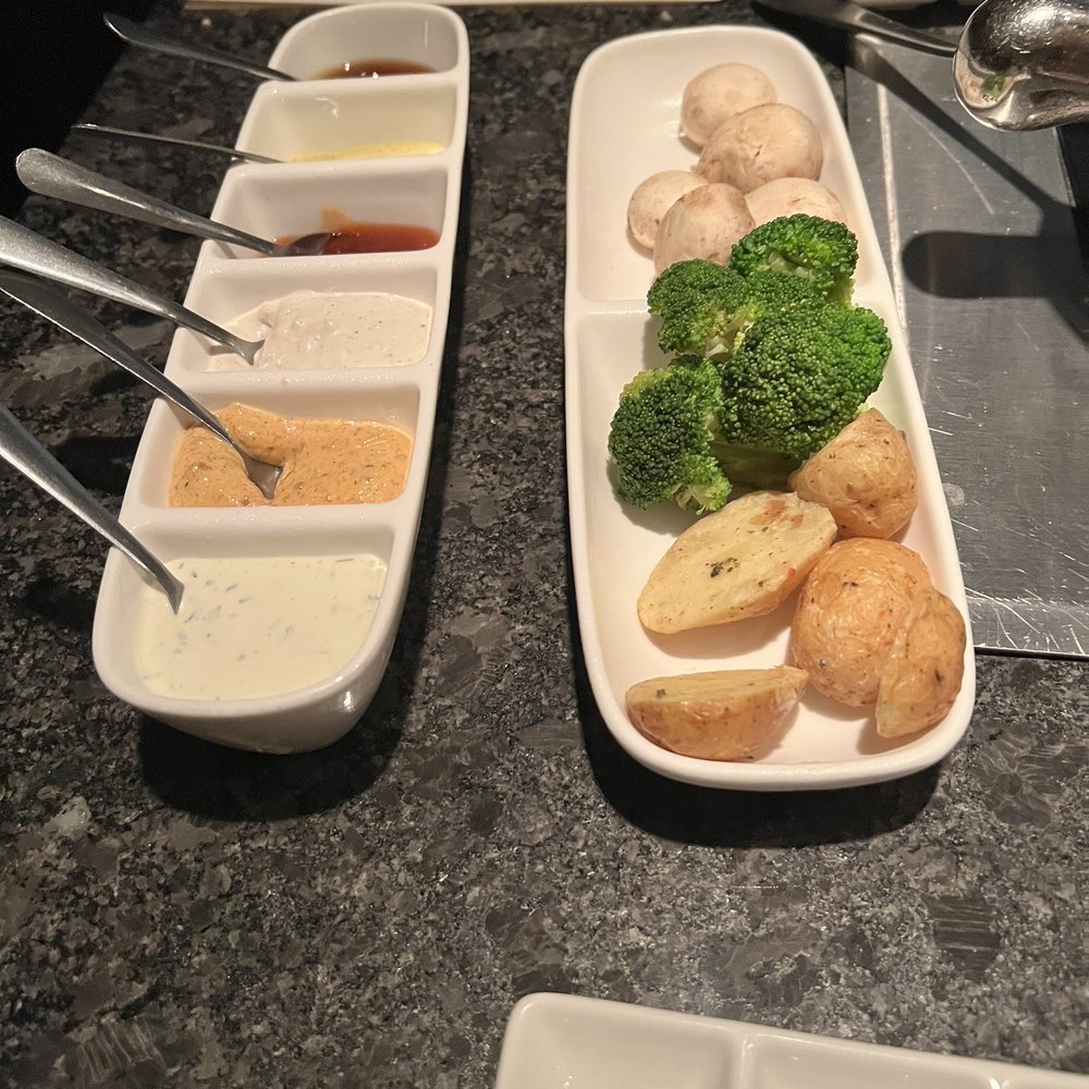 The Melting Pot - Veggies and sauces - Fondue Near Me - Orlando, Florida The Melting Pot - Veggies and sauces - Fondue Near Me - Orlando, Florida