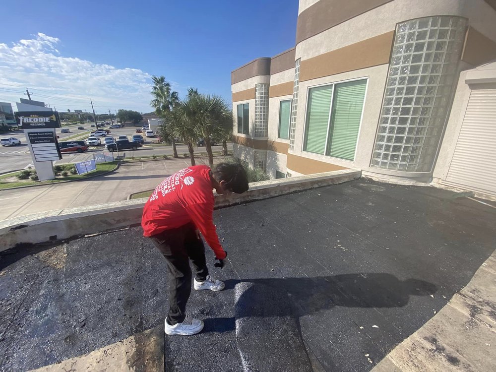 Slide of A Banda M Roofing