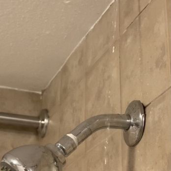 Ascot Suites - Water leaking from the pipe above the bathtub right into the bathtub - Hotels Near Me - Morro Bay, California Ascot Suites - Water leaking from the pipe above the bathtub right into the bathtub - Hotels Near Me - Morro Bay, California