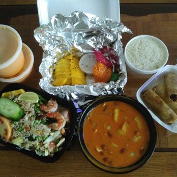 Jatujak - Clockwise from top: Mango Sticky Rice, Spring rolls, Massaman Beef, Jatujak fried rice with chicken and shrimp and Thai iced tea. - Food Delivery Services Near Me - Toronto, Ontario