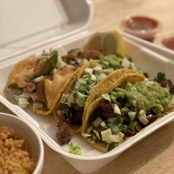 Tampico Meat Market - Carne asada and pescado tacos w/ a side of rice - they gave me salsa to-go