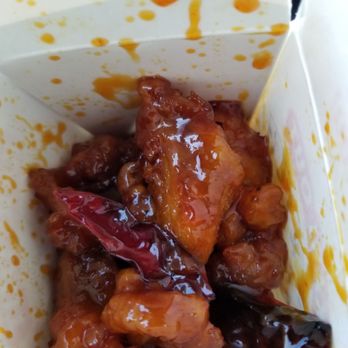 Hong Kong Express - "Spicy" orange chicken...they lied. It's not spicy at all even if you eat all of the peppers. - Chinese Near Me - Murrieta, California