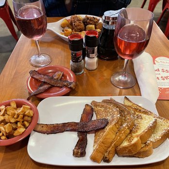 Ruby Sunshine Nashville - Brioche French Toast with Breakfast Potatoes and Applewood-Smoked Bacon - Breakfast & Brunch Near Me - Nashville, Tennessee Ruby Sunshine Nashville - Brioche French Toast with Breakfast Potatoes and Applewood-Smoked Bacon - Breakfast & Brunch Near Me - Nashville, Tennessee