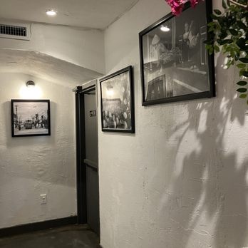 Ngon Vietnamese Kitchen - Interior with flowers and paintings - Vietnamese Near Me - New York, New York