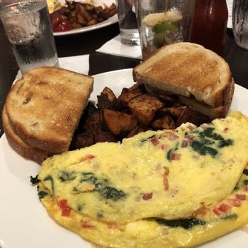 Firefly American Bistro & Bar - Greek omelette with sourdough toast - New American Near Me - Manchester, New Hampshire Firefly American Bistro & Bar - Greek omelette with sourdough toast - New American Near Me - Manchester, New Hampshire