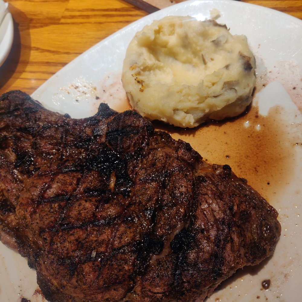 Outback Steakhouse - Bone in ribeye with mashed potatoes, medium - Steakhouses Near Me - Schaumburg, Illinois Outback Steakhouse - Bone in ribeye with mashed potatoes, medium - Steakhouses Near Me - Schaumburg, Illinois