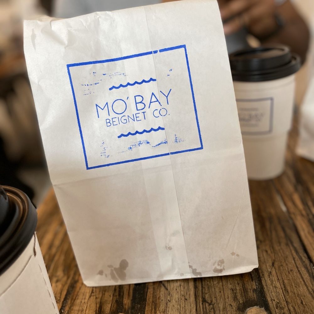 Mo'Bay Beignet - Something about grease spots on my the bag that makes me smile - Coffee & Tea Near Me - Mobile, Alabama Mo'Bay Beignet - Something about grease spots on my the bag that makes me smile - Coffee & Tea Near Me - Mobile, Alabama