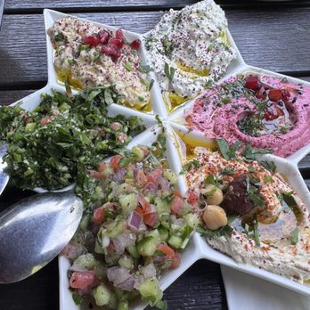 MAZRA - The Falafell Mezza Sampler platter with Arabic salad, tabbouleh, hummus, beet salad, tzatziki, and baba ghannoush. Yum! - Mediterranean Near Me - Redwood City, California MAZRA - The Falafell Mezza Sampler platter with Arabic salad, tabbouleh, hummus, beet salad, tzatziki, and baba ghannoush. Yum! - Mediterranean Near Me - Redwood City, California
