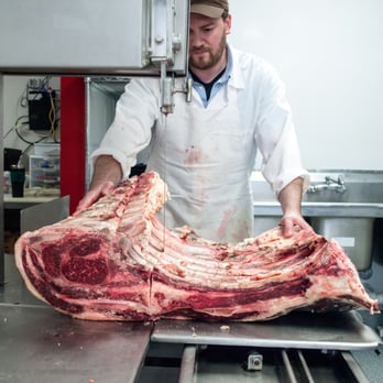 The Conscious Carnivore - a man in a butcher's kitchen - Butcher Near Me - Madison, Wisconsin