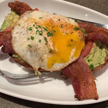 The Cellar - Avocado toast with works. Tomato, bacon and fried egg - Wine Bars Near Me - San Clemente, California The Cellar - Avocado toast with works. Tomato, bacon and fried egg - Wine Bars Near Me - San Clemente, California