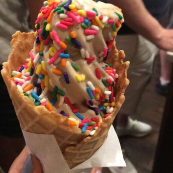 Bmore Licks - Kahlua soft serve with rainbow sprinkles in a waffle cone - Ice Cream & Frozen Yogurt Near Me - Baltimore, Maryland Bmore Licks - Kahlua soft serve with rainbow sprinkles in a waffle cone - Ice Cream & Frozen Yogurt Near Me - Baltimore, Maryland
