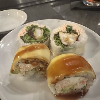 Umami Japanese Bistro - Sunshine Roll (front) and "Lob"st in Japan (back) - Japanese Near Me - Baton Rouge, Louisiana Umami Japanese Bistro - Sunshine Roll (front) and "Lob"st in Japan (back) - Japanese Near Me - Baton Rouge, Louisiana