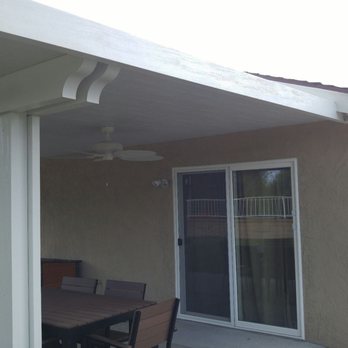 Patio Warehouse - Insulated patio cover with two ceiling fans and one power outlet, all recently installed by Patio Warehouse. - Patio Coverings Near Me - Orange, California Patio Warehouse - Insulated patio cover with two ceiling fans and one power outlet, all recently installed by Patio Warehouse. - Patio Coverings Near Me - Orange, California