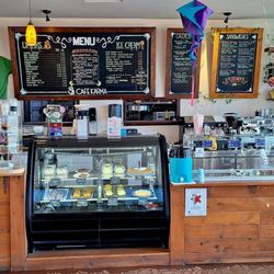 Cafe Karma - The usual coffeehouse fare, plus crepes and sandwiches.  I had a muffin and coffee.  Seated folks were behind me and to my left.
