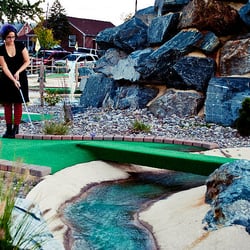 Perry Hall Mini Golf - This hole has a cool bridge over the water. Fun!