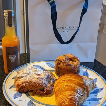L'Experience Paris - Bellevue - Croissant, twice baked croissant with chocolate, almond and banana and kouign-amman with goat cheese and tomato - Bakeries Near Me - Bellevue, Washington L'Experience Paris - Bellevue - Croissant, twice baked croissant with chocolate, almond and banana and kouign-amman with goat cheese and tomato - Bakeries Near Me - Bellevue, Washington