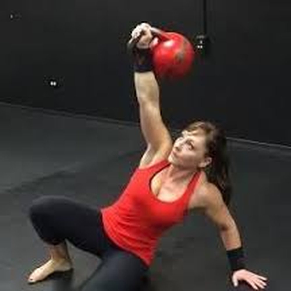 Idaho Kettlebells - Turkish Get-Up With Competition Bell - Interval Training Gyms Near Me - Eagle, Idaho Idaho Kettlebells - Turkish Get-Up With Competition Bell - Interval Training Gyms Near Me - Eagle, Idaho