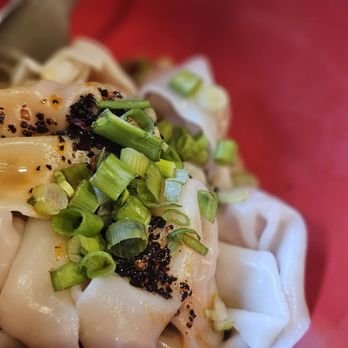 Hu's Cooking - Red chili wontons - Chinese Near Me - Houston, Texas Hu's Cooking - Red chili wontons - Chinese Near Me - Houston, Texas