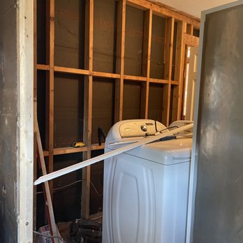 GBR Construction - a washer and dryer in a room under construction - General Contractors Near Me GBR Construction - a washer and dryer in a room under construction - General Contractors Near Me