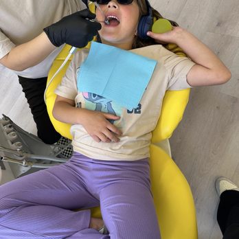 Tiny Tooth Co. - Criss crossed apple sauce because she's so relaxed! - Pediatric Dentists Near Me - Costa Mesa, California Tiny Tooth Co. - Criss crossed apple sauce because she's so relaxed! - Pediatric Dentists Near Me - Costa Mesa, California