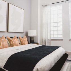 Modera Frisco Square - spacious bedrooms with cozy carpeting