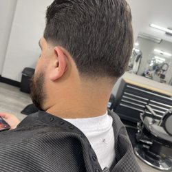 Culture Cutz - Taper with a trim on top. Make sure to call to set your next appointment