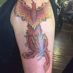 Idle Hands Tattoo & Piercing - I posted previously about Sloan smith and his excellent work here is the art he did for me the picture does not do it justice.