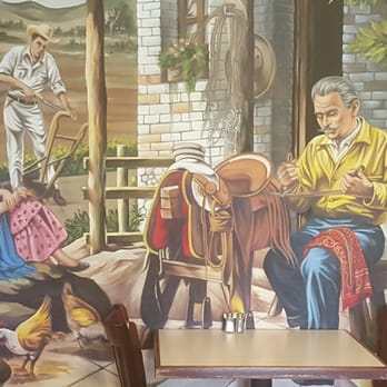 El Pueblito Mexican Restaurant - a mural of a man and a woman - Mexican Near Me - Independence, Kansas El Pueblito Mexican Restaurant - a mural of a man and a woman - Mexican Near Me - Independence, Kansas