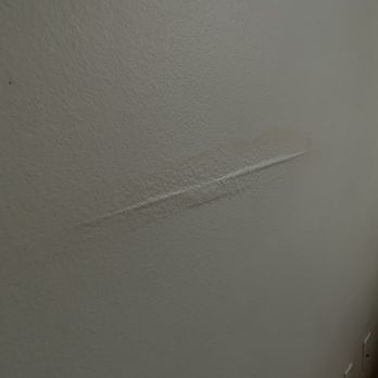Montecito at Dos Lagos Apartments - Water bubbling through wall from leaking water heater - Apartments Near Me - Corona, California