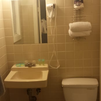 Seashell Motel - Basic, clean bathroom. Dated but everything worked fine. - Hotels Near Me - Key West, Florida Seashell Motel - Basic, clean bathroom. Dated but everything worked fine. - Hotels Near Me - Key West, Florida