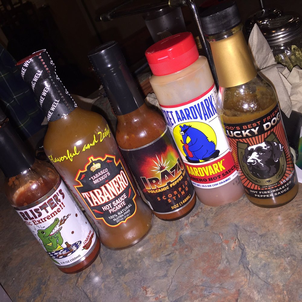 Bobby G's Pizzeria - Cool bottles of hot sauce. Accidentally had the Trinidad - Pizza Near Me - Berkeley, California