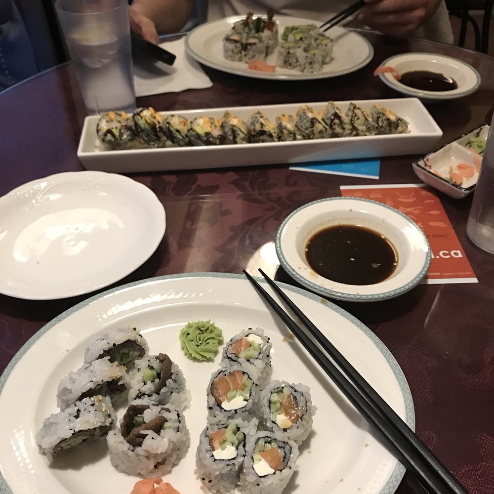 Sushi California - a plate of sushi and chopsticks - Sushi Bars Near Me - Winnipeg, Manitoba Sushi California - a plate of sushi and chopsticks - Sushi Bars Near Me - Winnipeg, Manitoba
