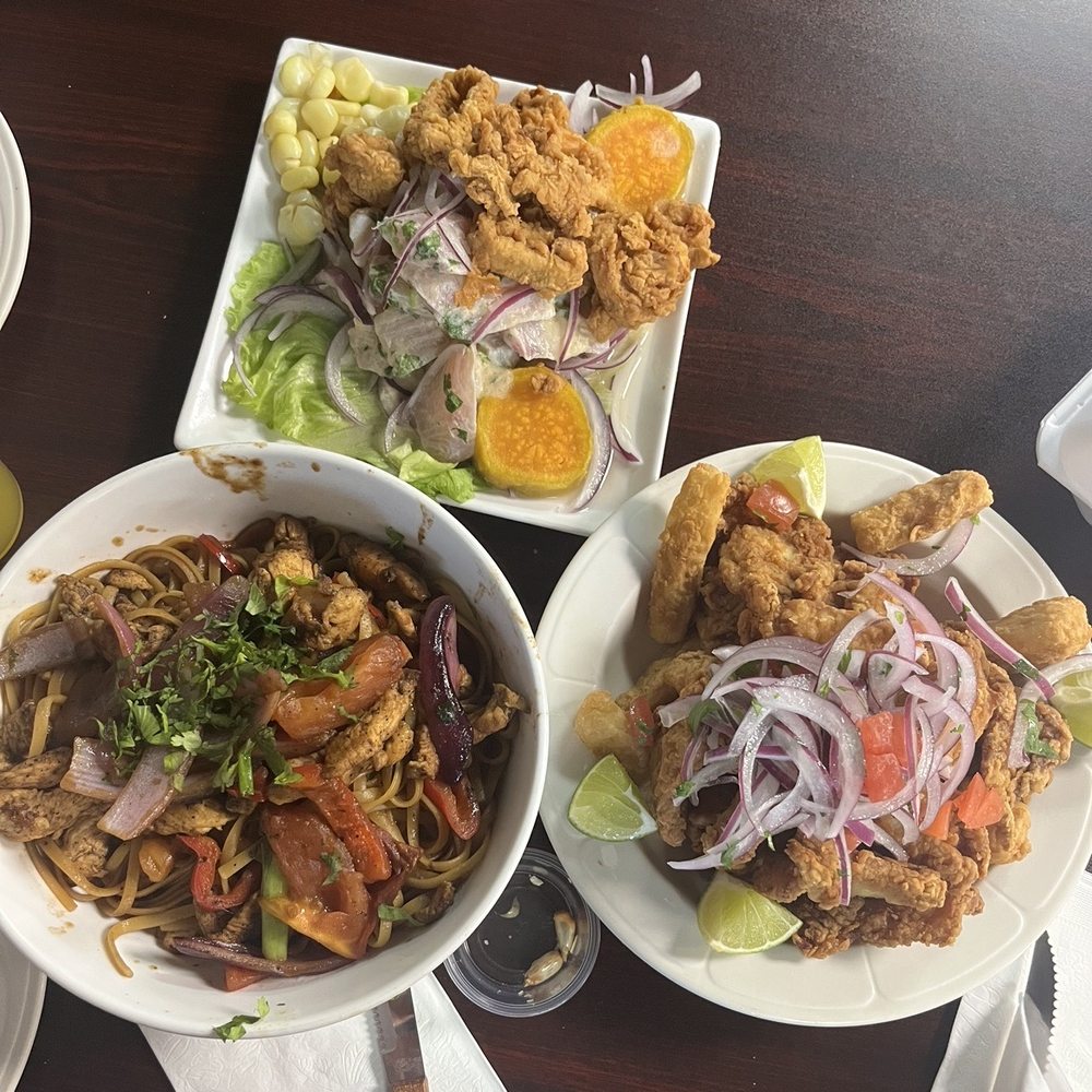 Ceviche Carretillero on top, Tallarin Saltado de Pollo bottom left and Chicharon De Pescado on the right. Ceviche Carretillero on top, Tallarin Saltado de Pollo bottom left and Chicharon De Pescado on the right.