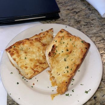 Eugene’s Gulf Coast Cuisine - Cheese bread - Steakhouses Near Me - Houston, Texas Eugene’s Gulf Coast Cuisine - Cheese bread - Steakhouses Near Me - Houston, Texas
