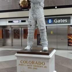 RTD SkyRide - Statue of Astronaut Jack Swigert (from Apollo 13) on the train platform in Terminal B