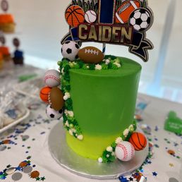 a cake with a number one on top a cake with a number one on top