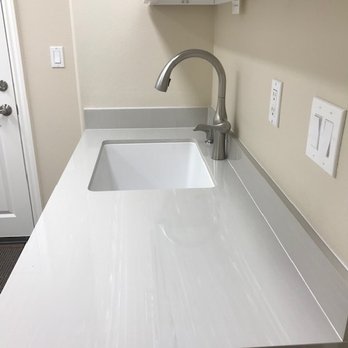 Giallo Stone - Laundry Room in Geoluxe Nuestros Gray - Kitchen & Bath Near Me - Los Angeles, California Giallo Stone - Laundry Room in Geoluxe Nuestros Gray - Kitchen & Bath Near Me - Los Angeles, California