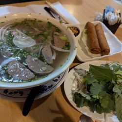 Saigon Cafe - Large pho bowl (rare meat flank and meatballs) and two vegetable spring rolls