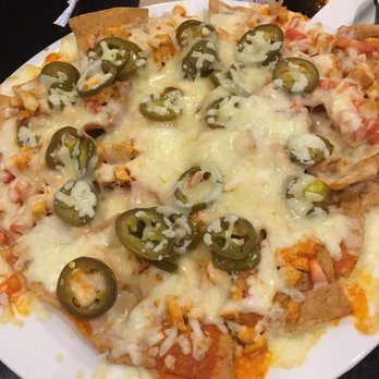 Jac's Cekola's Pizza - Buffalo chicken nachos, added jalapeños. - Pizza Near Me - Portage, Michigan Jac's Cekola's Pizza - Buffalo chicken nachos, added jalapeños. - Pizza Near Me - Portage, Michigan