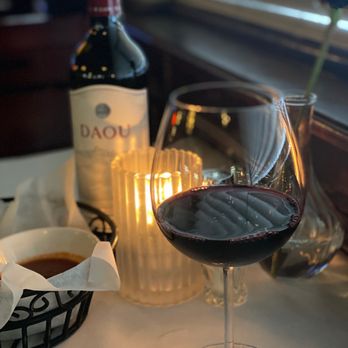 Eddie's Napolis Frisco - Candlelit table and wine - Pizza Near Me - Frisco, Texas