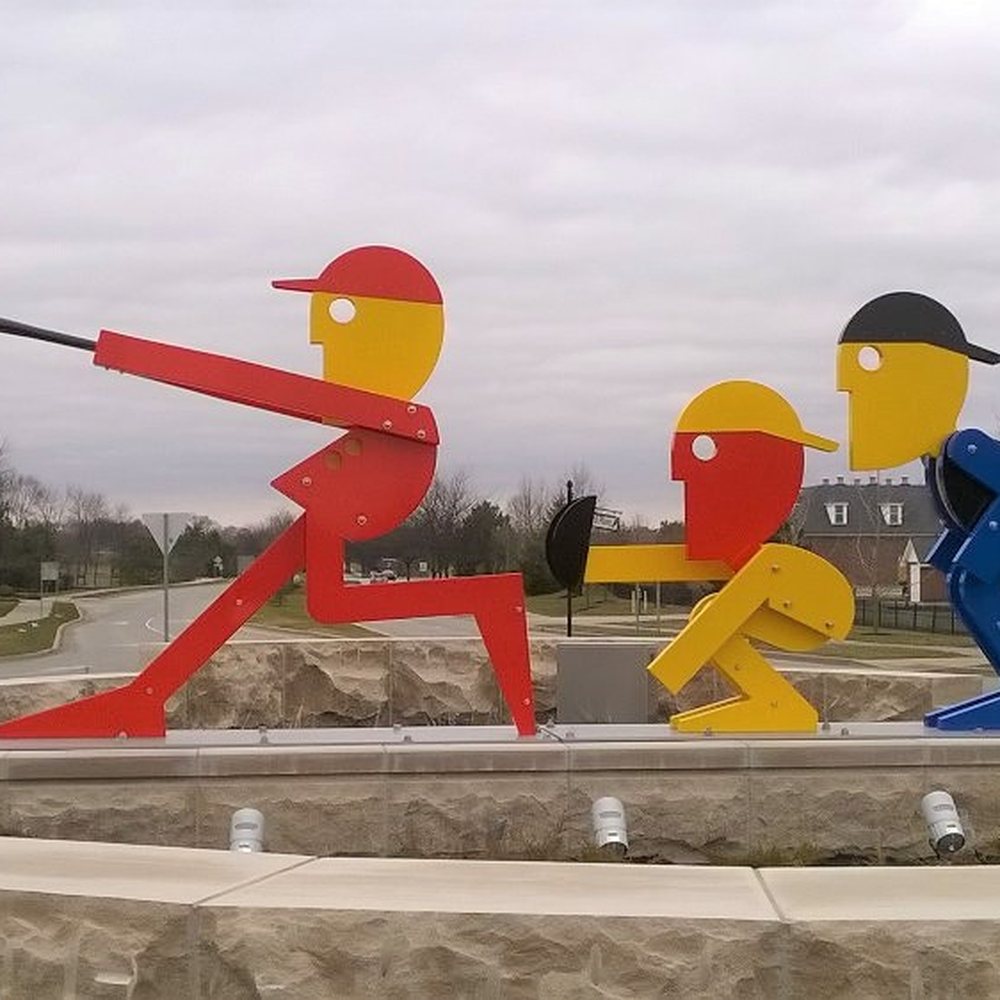 Hazel Dell Parkway Roundabout Sculptures - Home Run by Jorge Blanco 2017 at 126th St - Public Art Near Me - Carmel, Indiana Hazel Dell Parkway Roundabout Sculptures - Home Run by Jorge Blanco 2017 at 126th St - Public Art Near Me - Carmel, Indiana