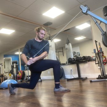 Kool Body Personal Training - Balance + Core. 
This full body functional exercise is an alternating lunge with cable twist. - Gyms Near Me - Del Mar, California