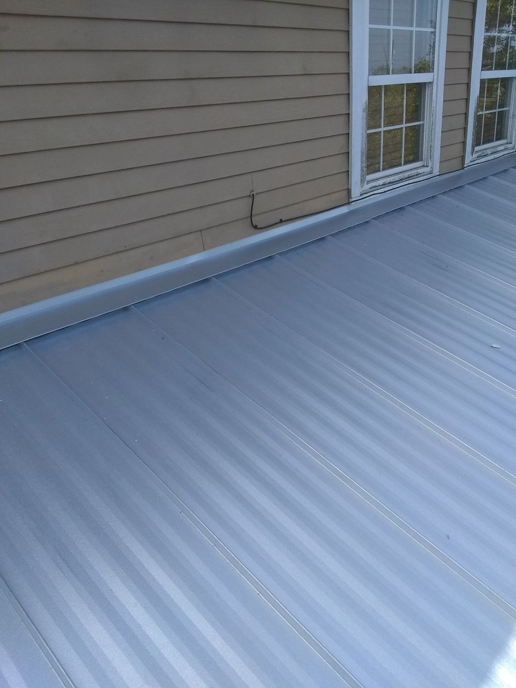 Slide of Camacho Roofing Construction