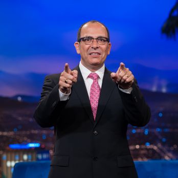 Comedian Nazareth - a man in a suit and tie giving a thumbs up - Comedy Clubs Near Me Comedian Nazareth - a man in a suit and tie giving a thumbs up - Comedy Clubs Near Me