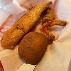 Sam's Southern Eatery - Two jumbo shrimp, one fried fish, and a roll as part of gumbo meal