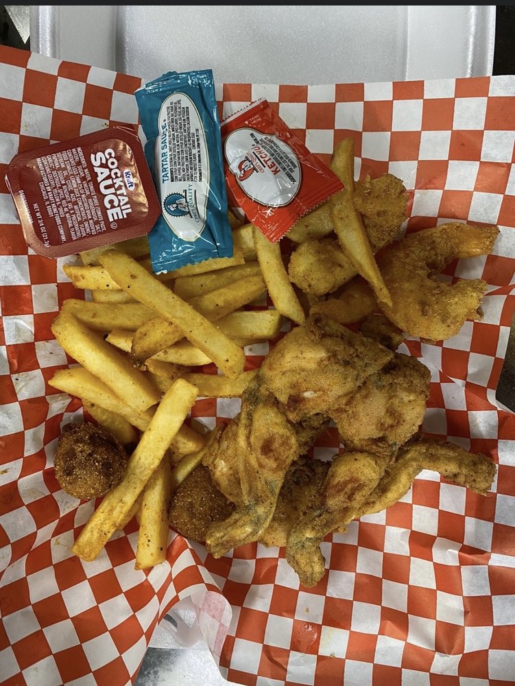 The taco spot Logo